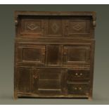 A 17th century oak court cupboard dated 1662,