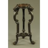 A 19th century ebonised urn stand stamped George Watson Edinburgh,