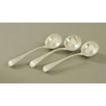 Three silver sauce ladles, a pair London 1841 Chawner & Co (George William Adams) and another 1823,