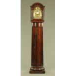 A 19th century mahogany pillar clock, with eight day striking movement by Francis Wells, London.