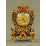 A 19th century French faux tortoiseshell and brass marquetry mantle clock,