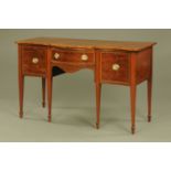 A 19th century mahogany and crossbanded serpentine fronted sideboard,