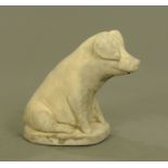 A composition cast stoneware model of a pig in seated pose. Height 46 cm.