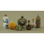 A collection of Chinese and other eastern snuff bottles, ceramic, enamel, silver coloured metal,
