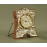 An Edwardian silver faced strut clock, Joseph Gloster Birmingham 1907. Height 11.5 cm, width 10 cm.
