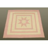 An Elizabeth Sanderson star pattern quilt. 214 cm x 240 cm.