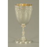 A Victorian silver presentation cup, foliate engraved 1871. 368 grams, height 21.