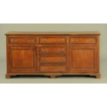 A George III style mahogany dresser base,