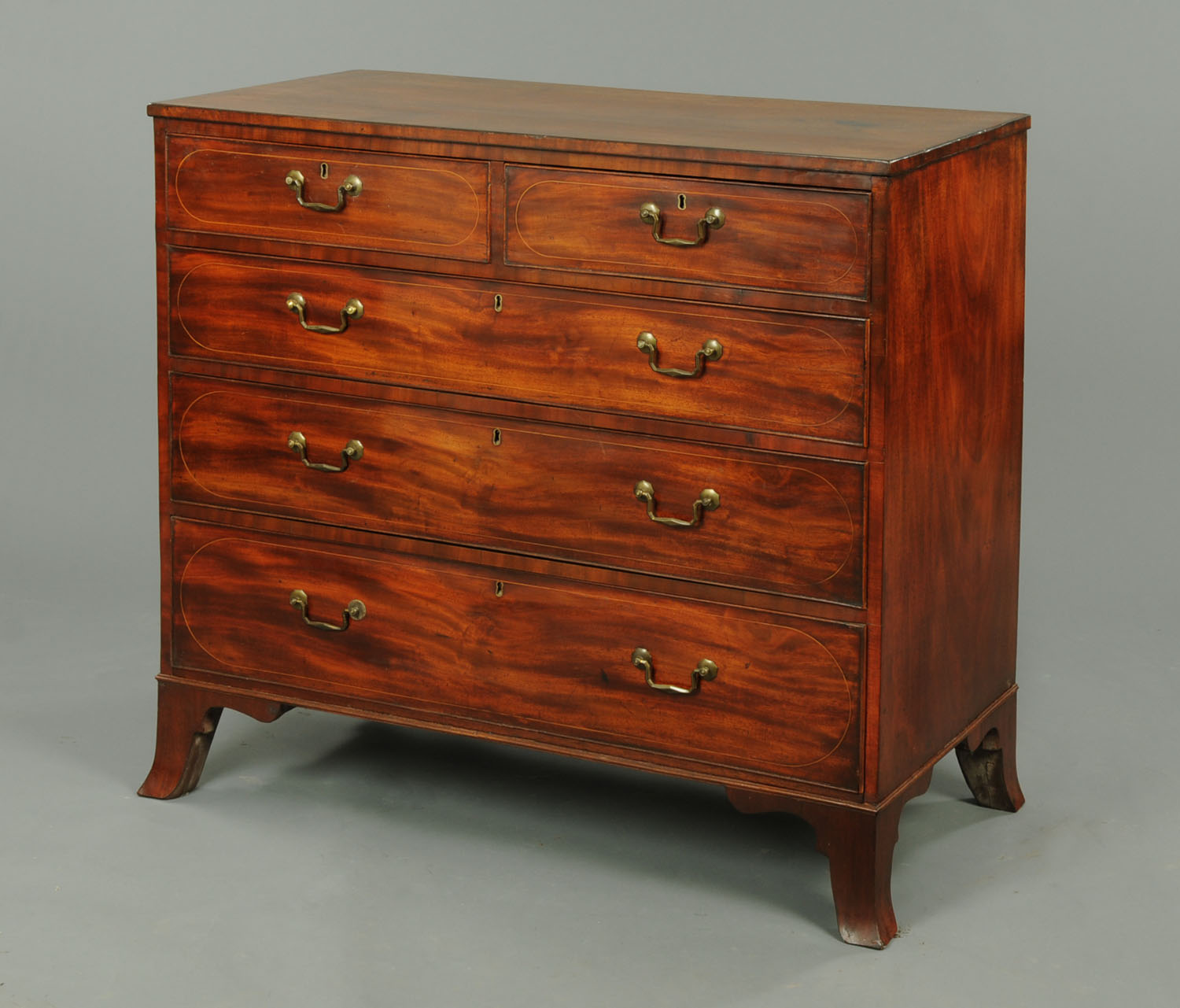 A George III mahogany chest of drawers,