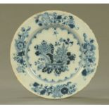 An 18th century Bristol blue and white Delft plate. Diameter 23 cm.