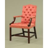 A mahogany Gainsborough style armchair, with deep buttoned back,