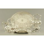 A late Victorian wooden cased silver plated extensive tea service,