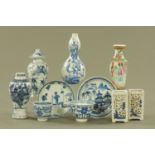 A collection of principally Chinese vases, tea bowls and saucers. Tallest 18 cm.