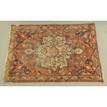 An antique Persian design rug, with centre shape medallion,