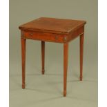 An Edwardian mahogany square envelope card table,