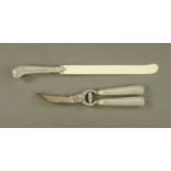A Victorian silver handled ivory letter knife, pistol grip, London 1883,