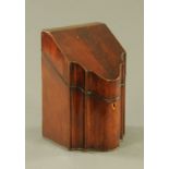 A George III mahogany serpentine fronted knife box, complete with fitted interior. Width 22.