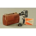 A vintage Bolex zoom reflex cine camera with case.