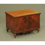 A Victorian mahogany crossbanded rectangular box, with shaped apron and raised on short turned legs.