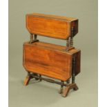 A late Victorian rosewood two tier Sutherland table. Height 76 cm, width 61 cm.