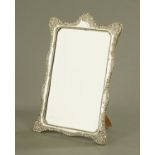 A late Victorian silver framed easel backed mirror, with bevelled glass, Chester hallmark 1901.