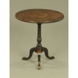 An 18th century pollard oak snap top tripod table, with well figured top,