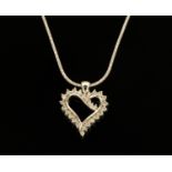 An 18 ct white gold heart shaped pendant on chain, set with diamonds weighing +/- .52 carats.