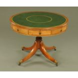 A Regency mahogany drum table, with green tooled leather top,