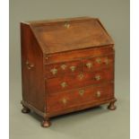 A William and Mary walnut bureau, with slope front to stepped interior and well,