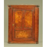 An elm corner cupboard,