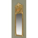 A gilt framed bevelled glass mirror with tapestry panel above,