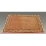 A Persian design fringed carpet,