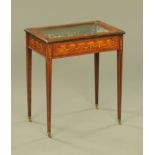 A late Victorian/Edwardian rosewood bijouterie cabinet, with shell swag and ribbon inlay.