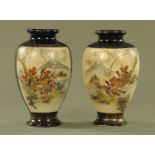 A pair of Japanese Satsuma vases, decorated with Mount Fuji, birds and branches, Meiji period.