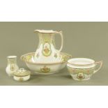 A Victorian Corona Ware toilet jug and basin set, with scale and handpainted decoration.