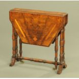 A late Victorian walnut small Sutherland table, with satinwood inlay and canted angles,