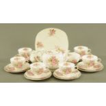 A Tuscan bone china tea set, 6 cups, saucers, plates, 1 large plate, sugar basin,