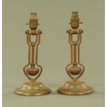 A pair of antique brass gimbal lamps. Height 30 cm.