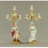 A pair of Ernst Bohne of Rudolstadt Thuringia candlesticks, figural,