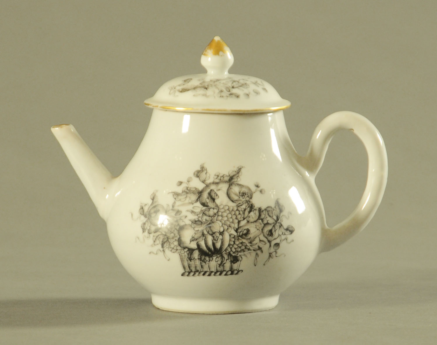 A 19th century Chinese Grisaille teapot, decorated with a basket of flowers.