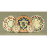 Five 19th century spongeware plates, three large and two small. Largest diameter 22.5 cm.