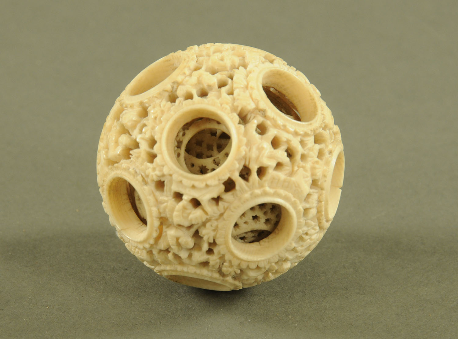 A 19th century Cantonese carved ivory concentric puzzle ball, diameter +/- 5.5 cm.