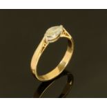 An 18 ct gold marquise cut diamond ring, size S.