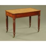 A 19th century mahogany writing table, with tooled leather writing surface and crossbanded edge,