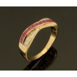A 9 ct gold ruby and diamond ring, size N/O.