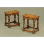 A pair of 17th century style oak reproduction joint stools, each 44 cm x 43 cm x 25 cm.