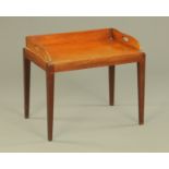 A mahogany tray, with stand raised on tapered legs of square section. Width 62 cm.