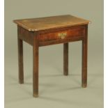 A George III oak side table, with rounded corners and frieze drawer, crossbanded and cockbeaded.