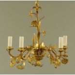 A gilt metal five branch light fitting.