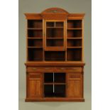 A large Edwardian walnut bookcase,